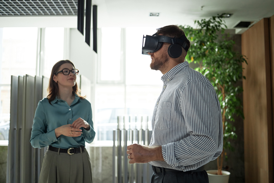 Two people doing training wearing a virtual reality headset
