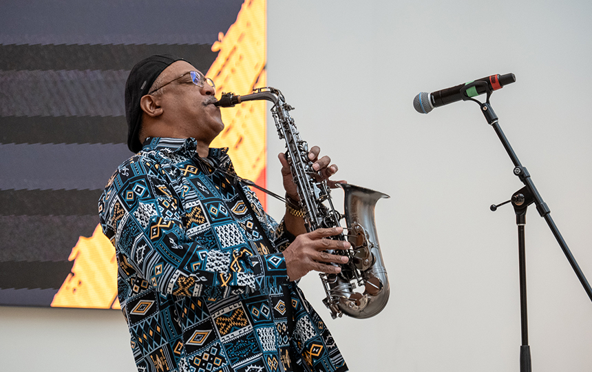 A man playing the saxophone
