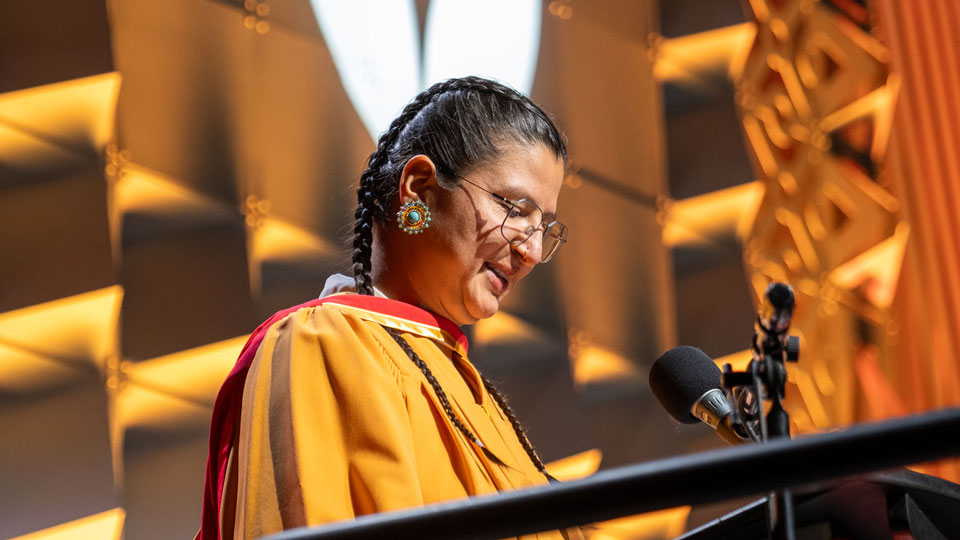 A women giving a speech
