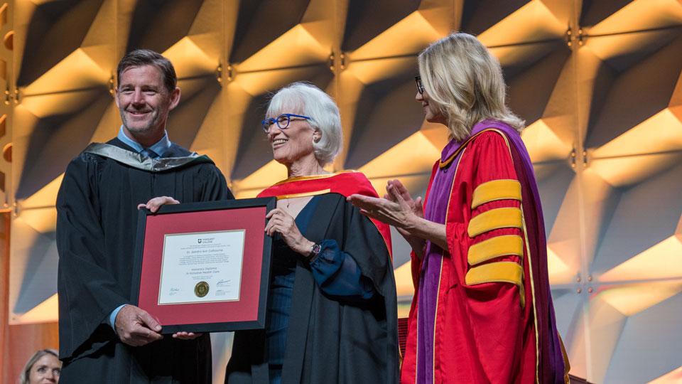 Dr S. Ann Colbourne receiving her honorary diploma